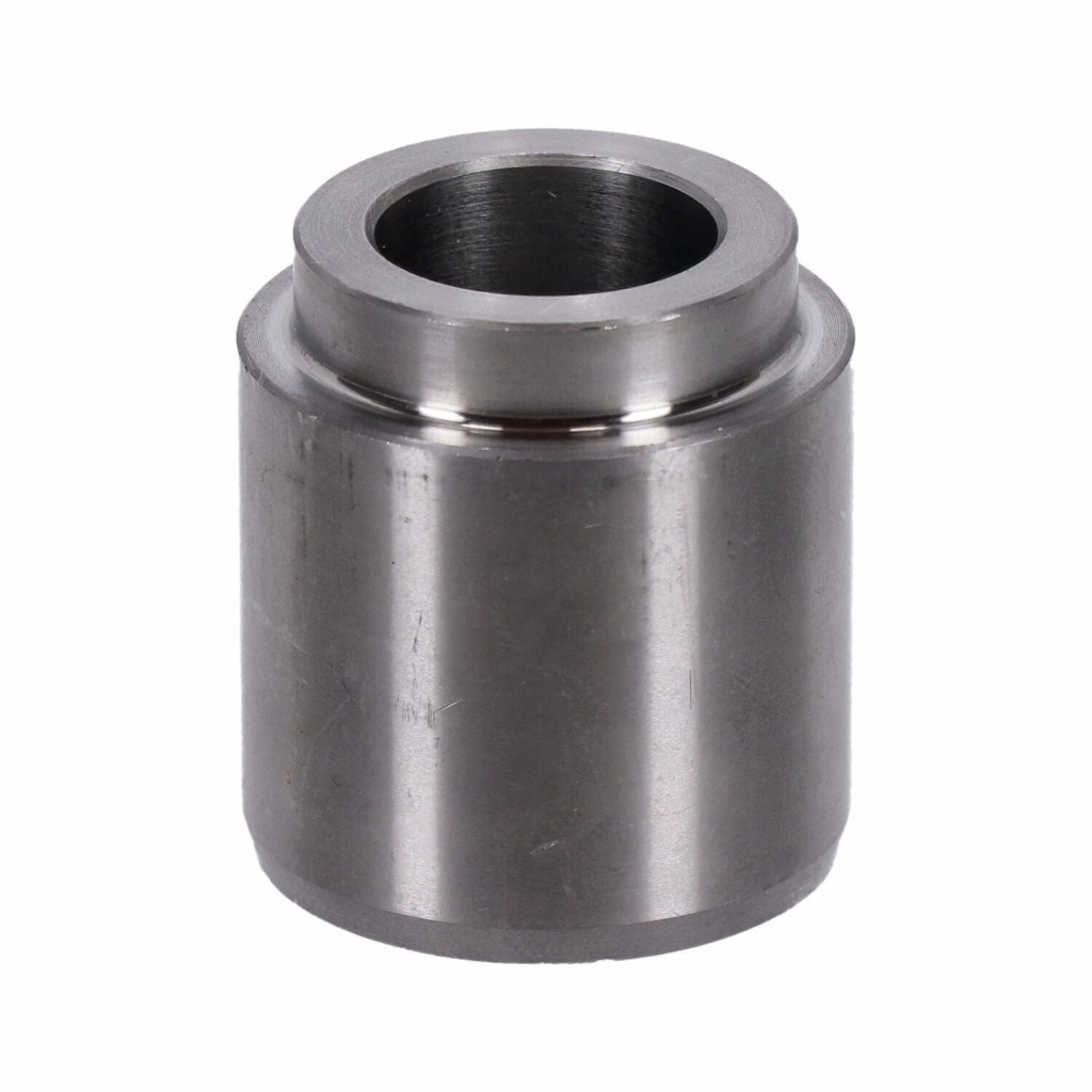 Spacer, left side swingarm 06-17 Dyna