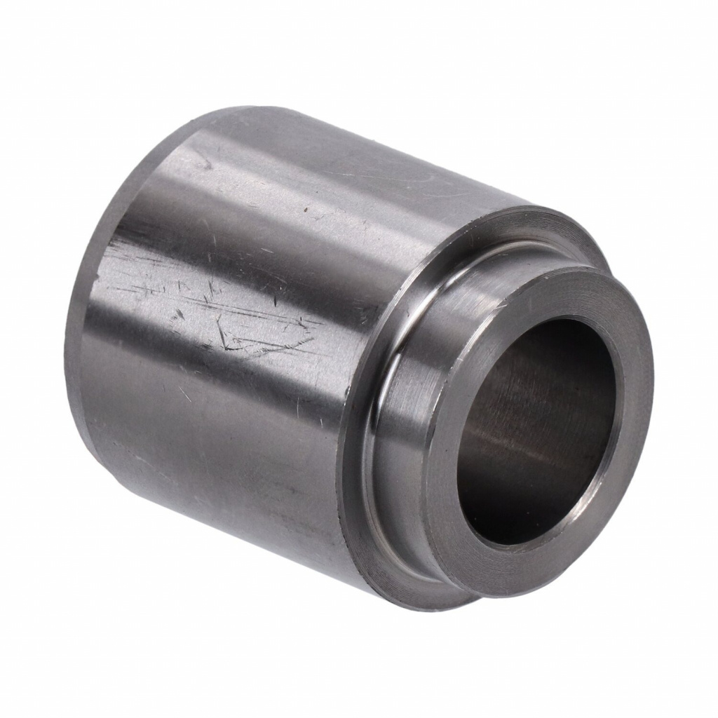 Spacer, left side swingarm 06-17 Dyna